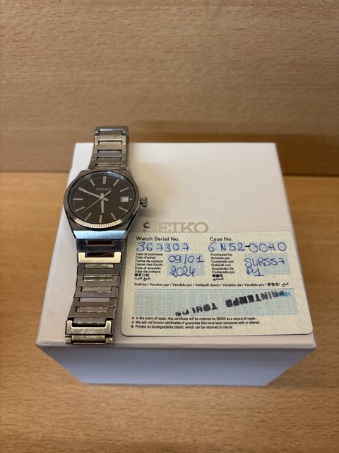 Montre Seiko quartz acier cadran noir dateur