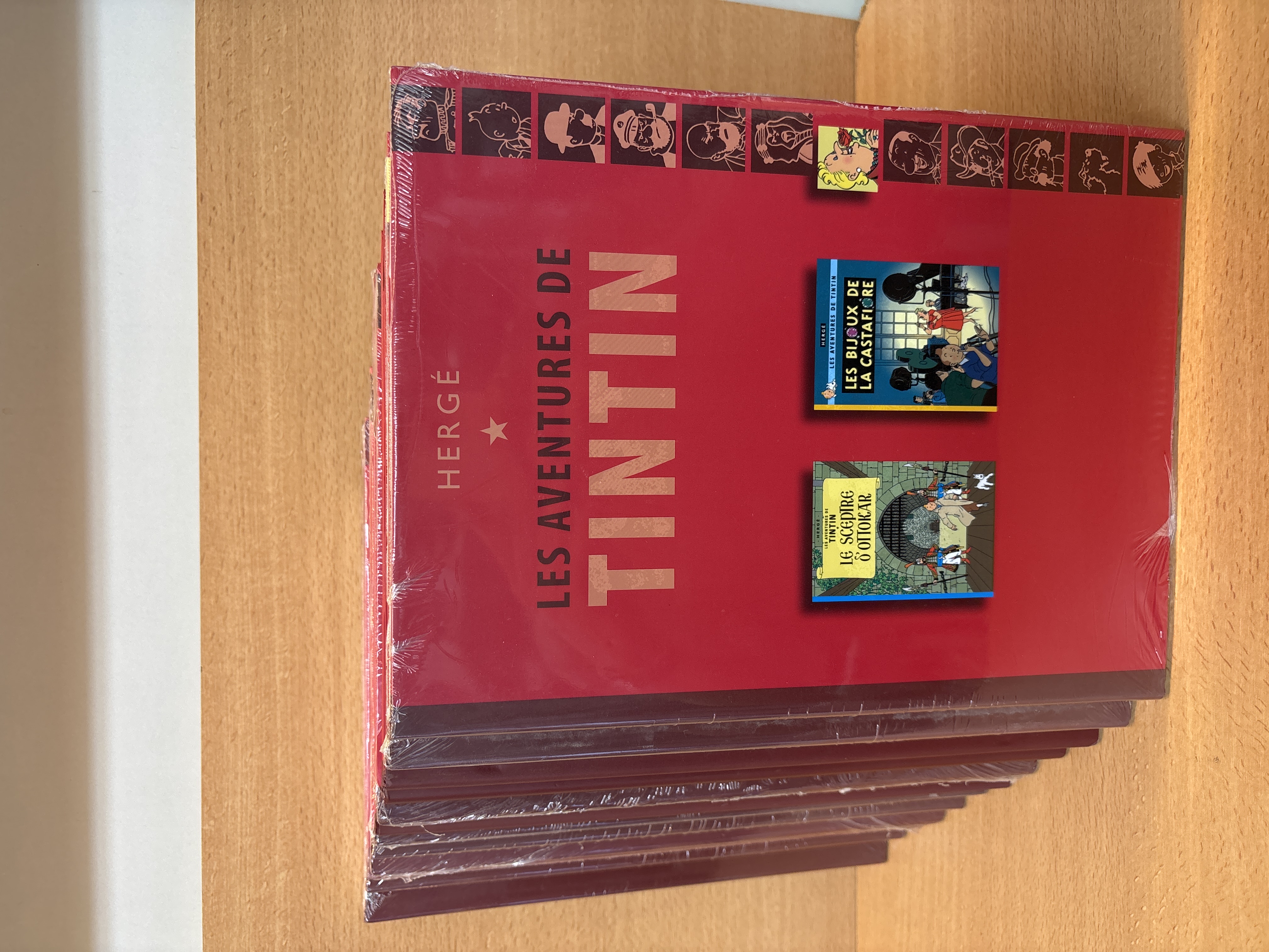 Lot de 12 albums Tintin Hergé sous blister