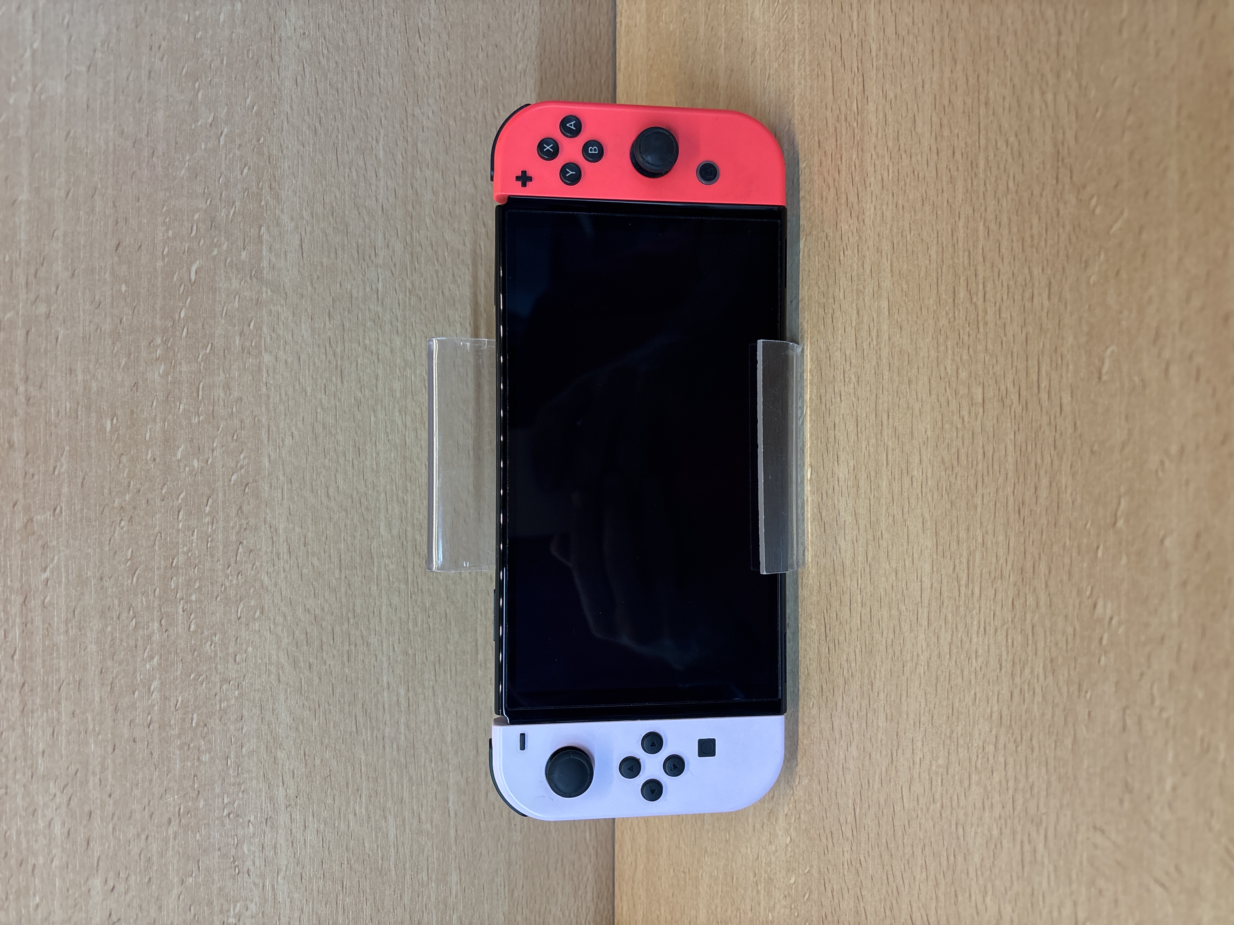 Console Nintendo Switch avec Joy-Con rouge et violet sans dock — photo 3
