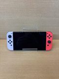 Console Nintendo Switch avec Joy-Con rouge et violet sans dock — photo 3