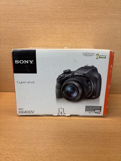 Appareil photo bridge Sony DSC-HX400V avec batterie, chargeur et notice