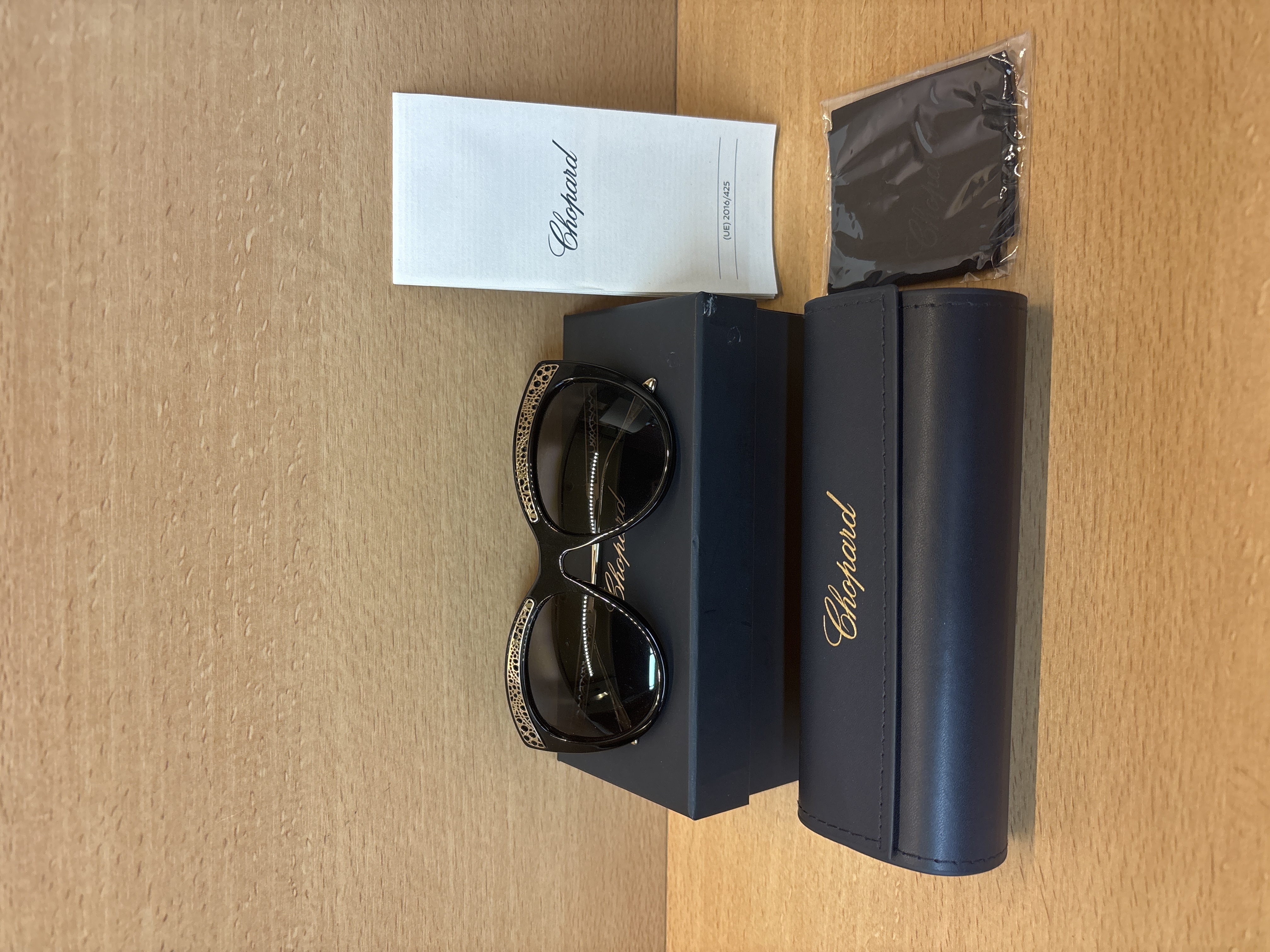 Lunettes de soleil Chopard SCHC24S noir doré 57-17-140
