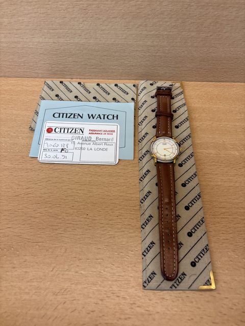 Montre Citizen Quartz homme 1991 bracelet cuir marron avec date