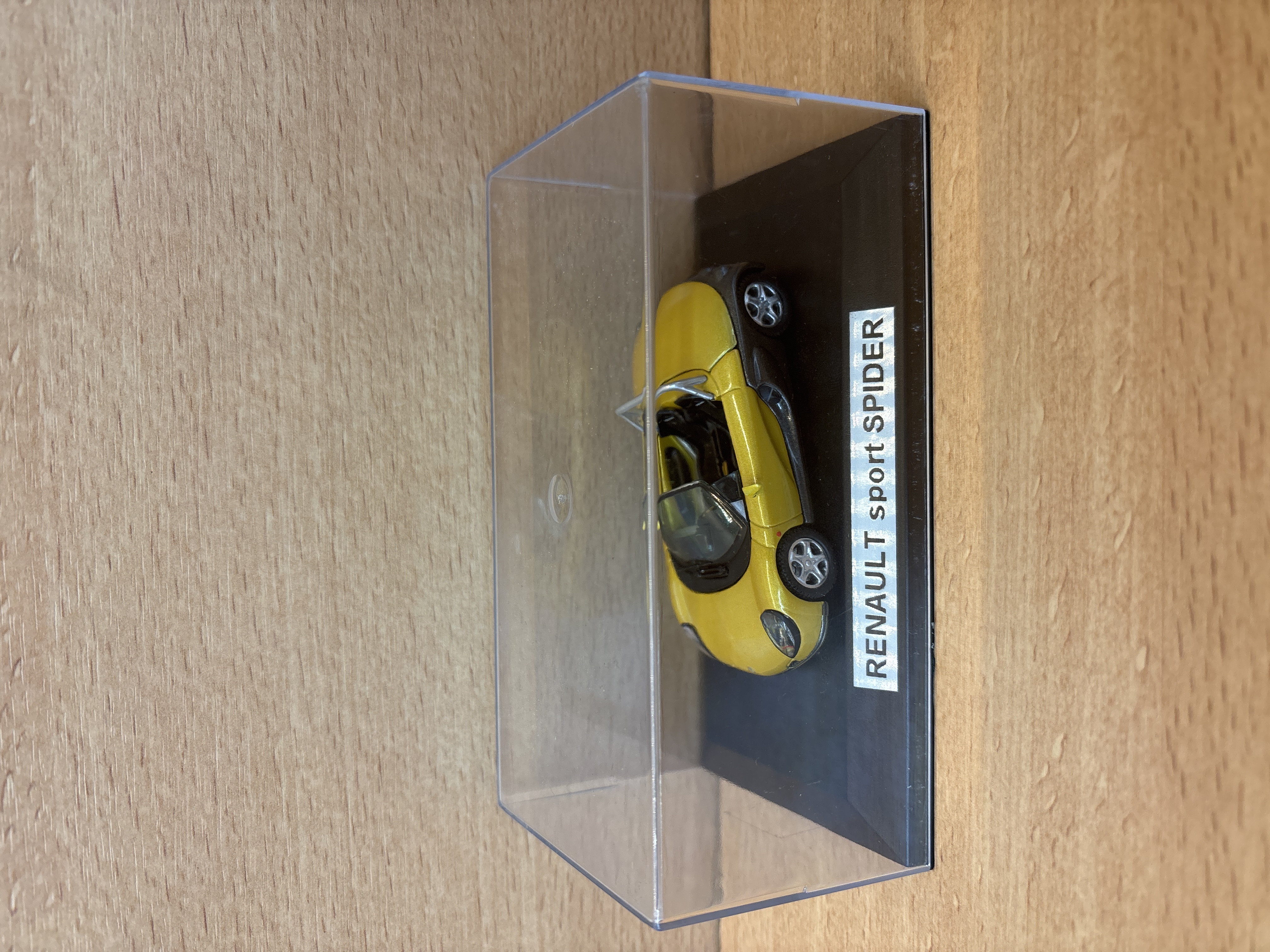Miniature Renault Sport Spider jaune avec vitrine