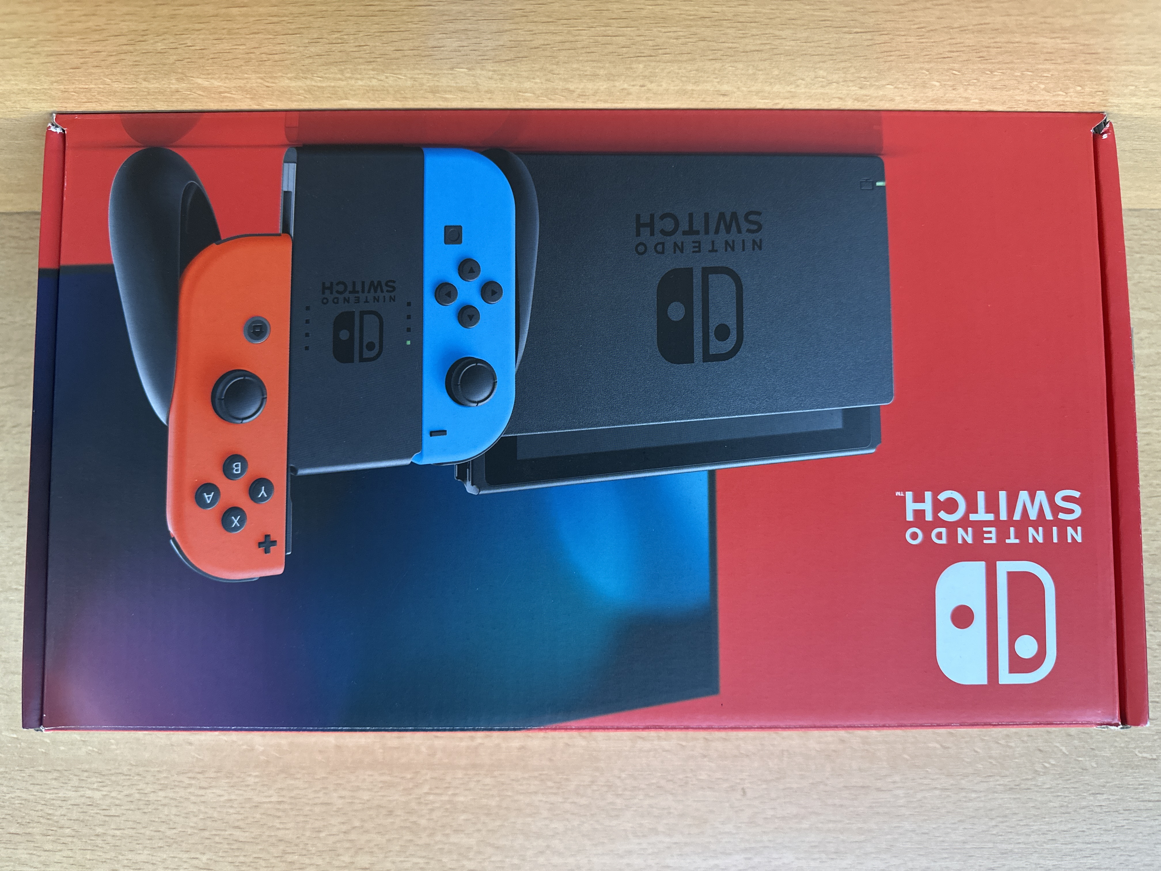 Console Nintendo Switch bleu néon rouge néon